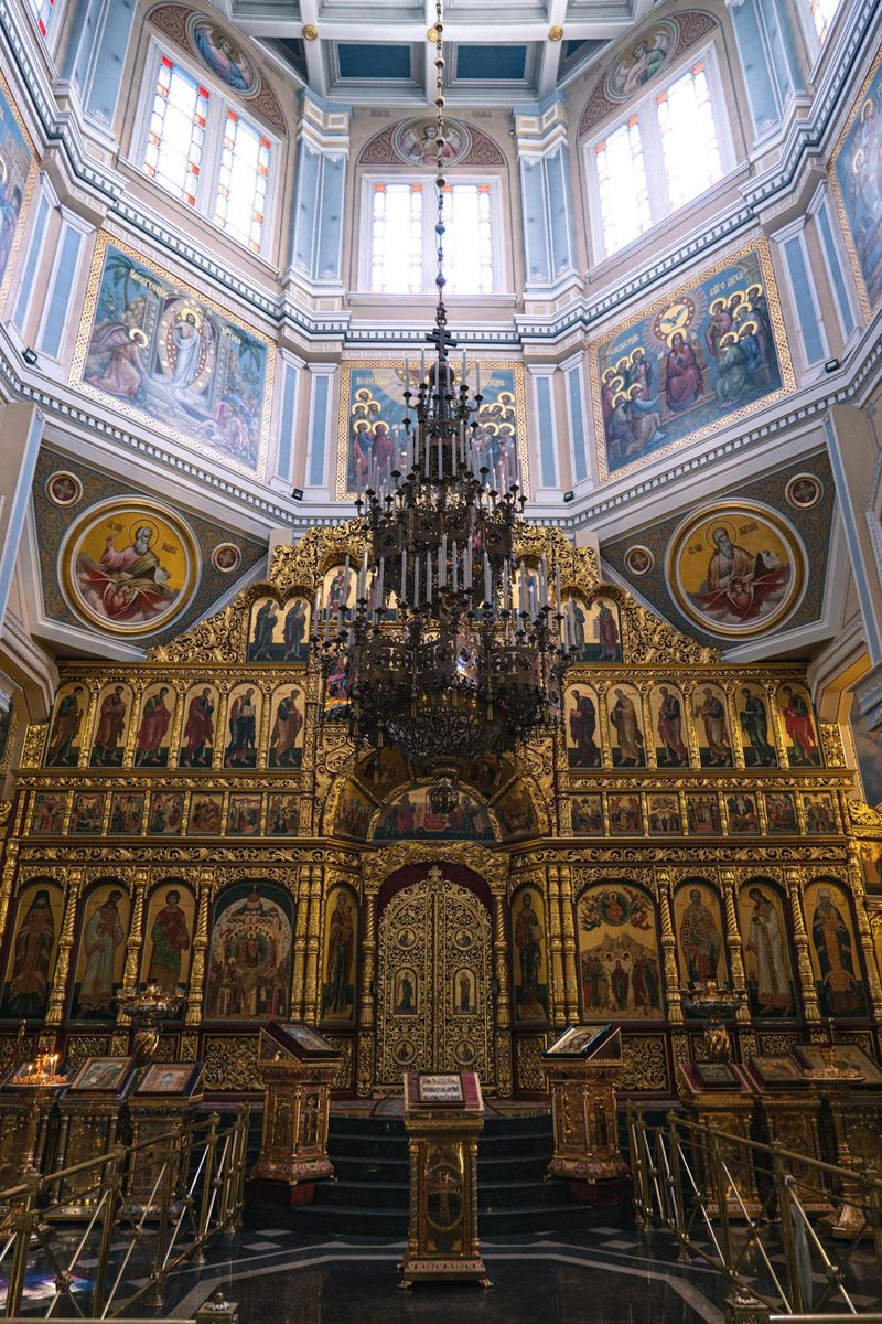 Ornate Eastern Orthodox church interior with golden iconostasis, representing the Nicene faith preserved in the Church's liturgical tradition
