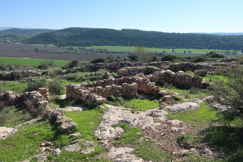 Excavations at Khirbet Qeiyafa — the Iron IIA fortified ridge site in the Elah Valley of the Judean Shephelah, with its distinctive casemate city wall visible in cross-section