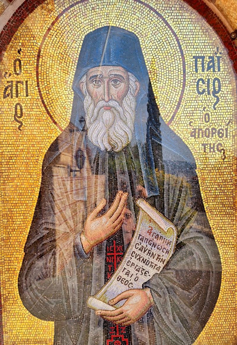 An Orthodox monk in prayer with a prayer rope (komboskini), practicing the ancient Jesus Prayer tradition of hesychasm.