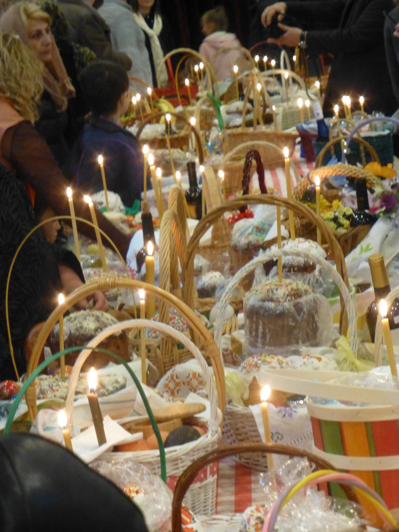Easter baskets prepared for blessing at an Eastern Orthodox church, marking the joyful end of the Great Lent fast.