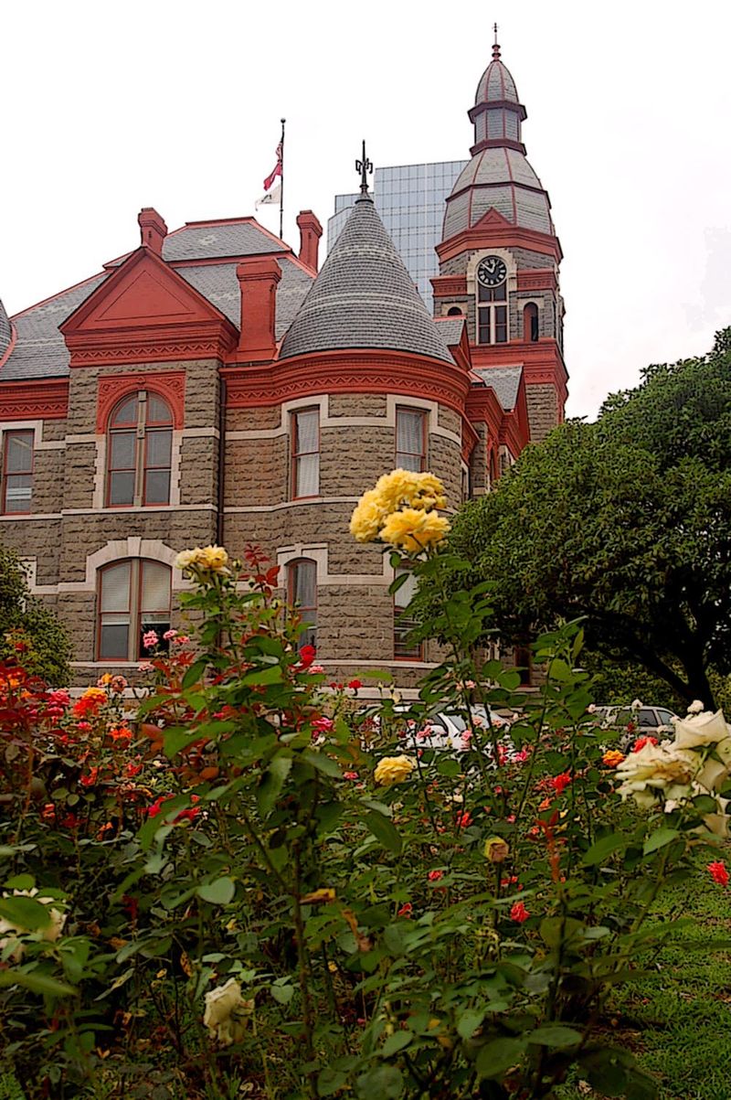 The Pulaski County Courthouse in Little Rock, Arkansas — Romanesque-Revival brick-and-stone tower with roses in the foreground, representing the Arkansas appellate-court system the petition for review accesses.