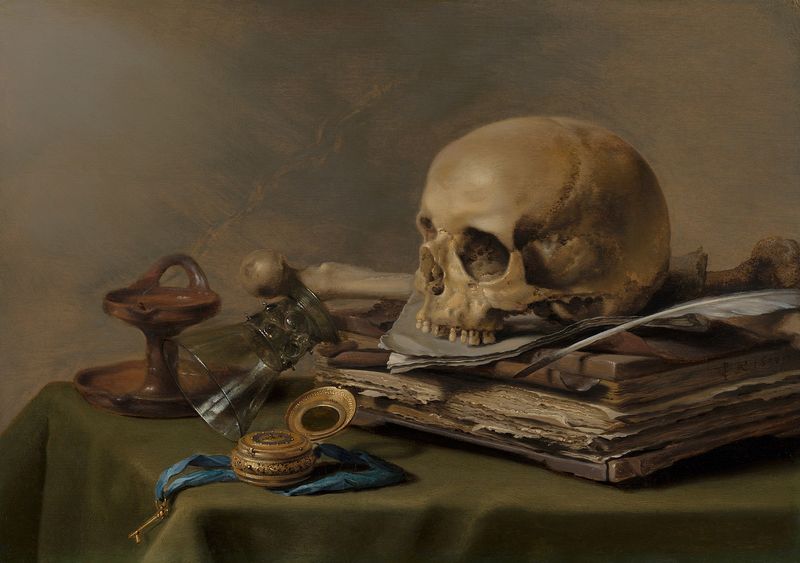 Pieter Claesz, 'Vanitas Still Life' (1630) — a Dutch Golden Age still life with a skull on a table beside an overturned roemer, a quill, and a sheaf of papers, the philosophical foundation of why we need a residuary clause: we cannot anticipate everything we will own at death.